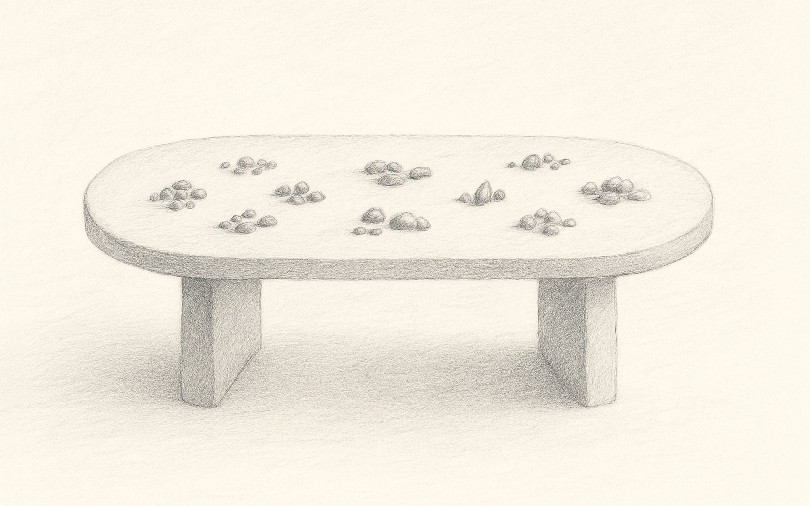 Minimalist sketch of stone table with scattered pebbles symbolizing brand elements